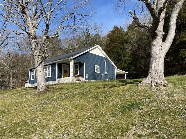 view of front of home with a front yard