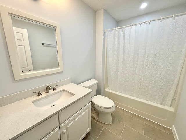 bathroom featuring toilet, shower / bathtub combination with curtain, and vanity