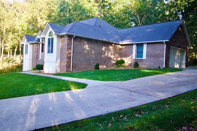 view of front of property featuring a garage, driveway, roof with shingles, a front lawn, and brick siding