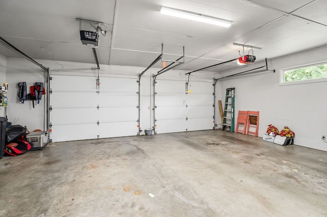 garage featuring a garage door opener