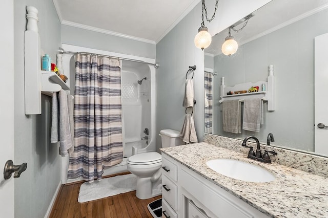 bathroom featuring toilet, ornamental molding, wood finished floors, shower / bath combination with curtain, and vanity