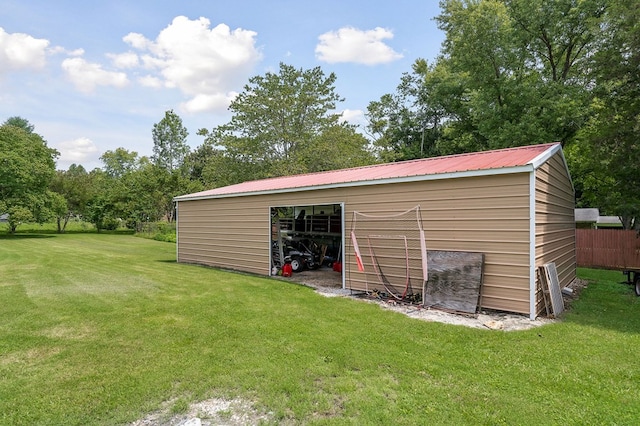 view of pole building featuring a yard