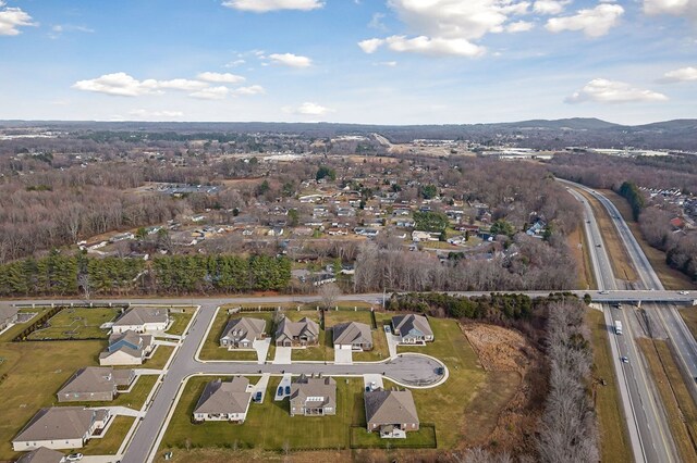 bird's eye view featuring a residential view and a mountain view