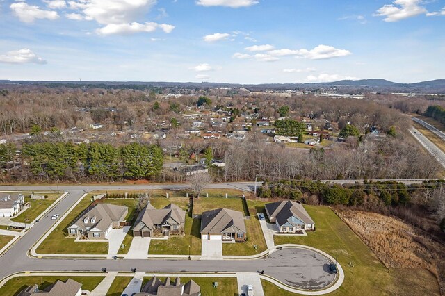 bird's eye view featuring a mountain view and a residential view