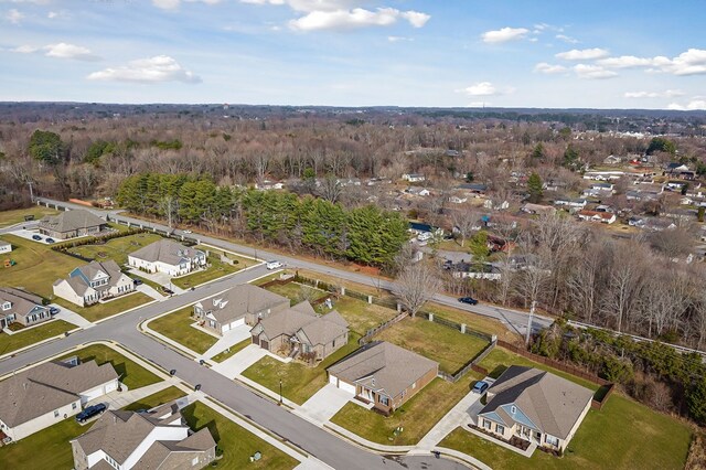 birds eye view of property with a residential view