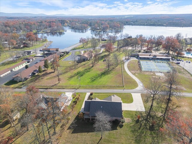 drone / aerial view with a residential view and a water view