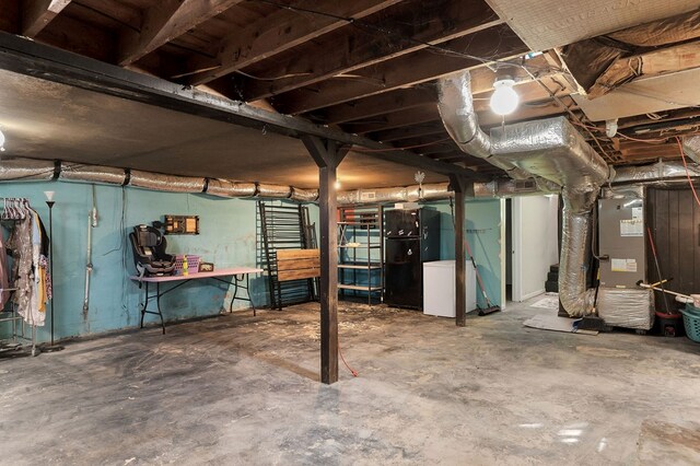 unfinished basement with heating unit