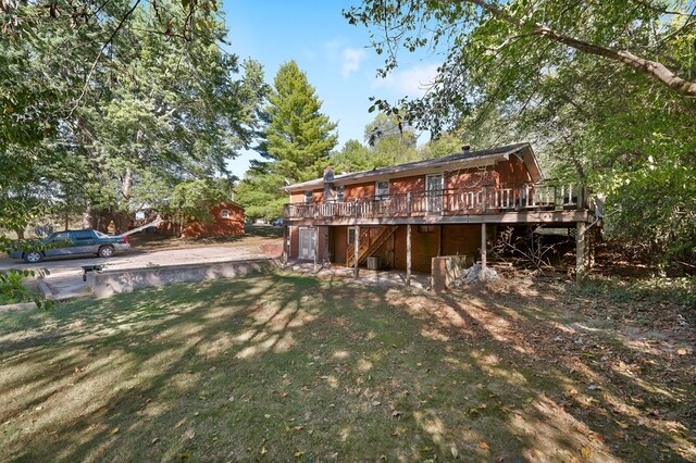 view of yard featuring a wooden deck