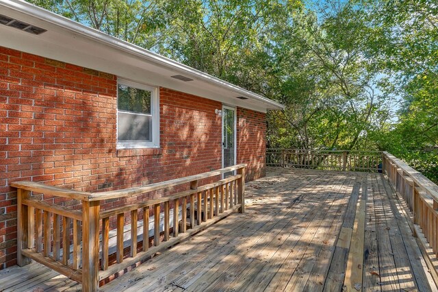 wooden terrace with visible vents