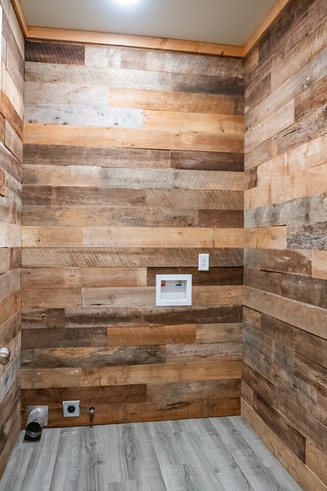 interior space featuring wood walls