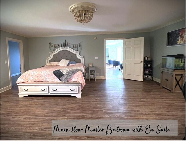 bedroom featuring ornamental molding, dark wood finished floors, and baseboards