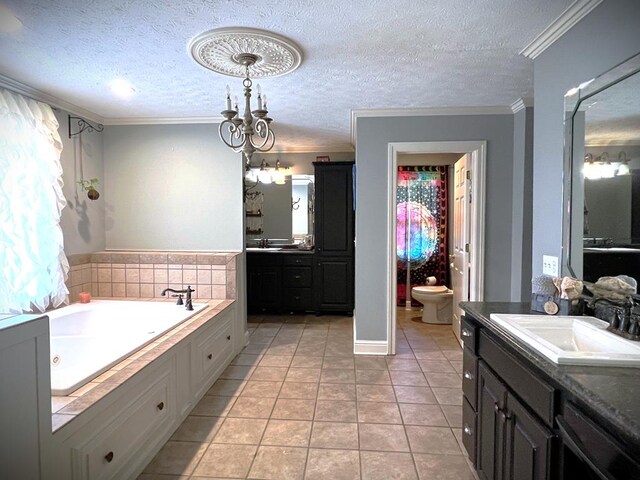 full bath with two vanities, a sink, tile patterned flooring, crown molding, and a bath