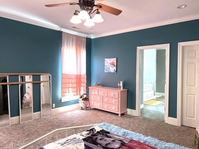 bedroom featuring baseboards, carpet, visible vents, and crown molding