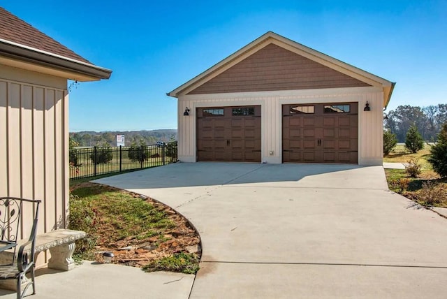 detached garage with fence