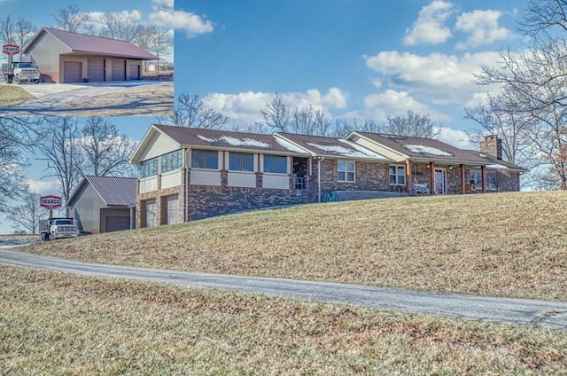 single story home with brick siding, a chimney, and a front yard