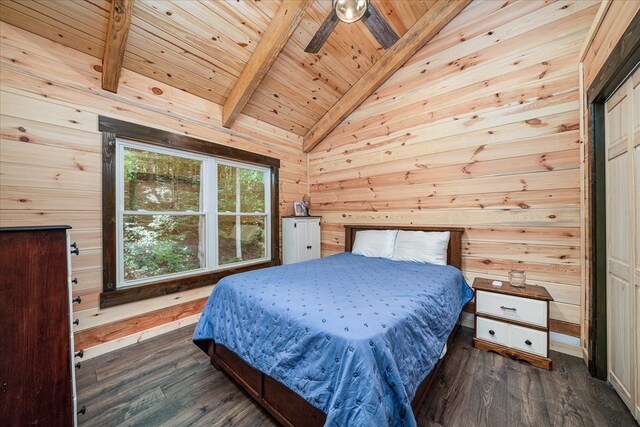 bedroom featuring wood ceiling, wood walls, dark wood finished floors, and lofted ceiling with beams