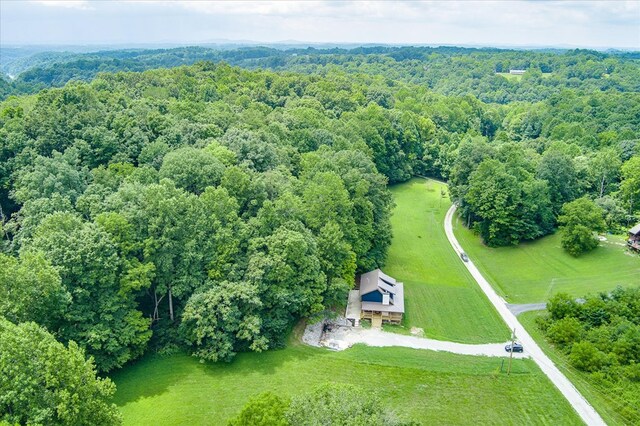 bird's eye view featuring a forest view