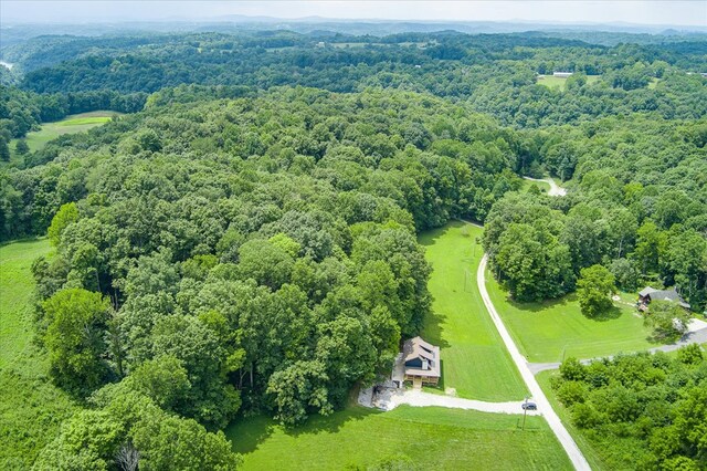 aerial view featuring a view of trees