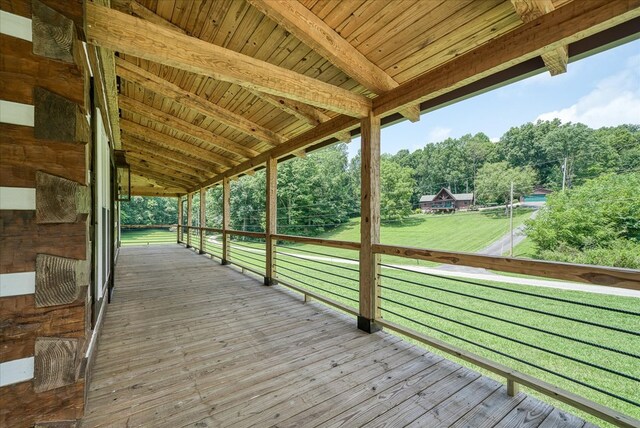 deck featuring a lawn