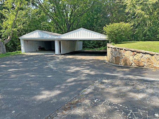 garage featuring driveway