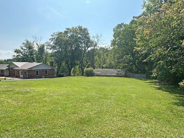 view of yard featuring fence