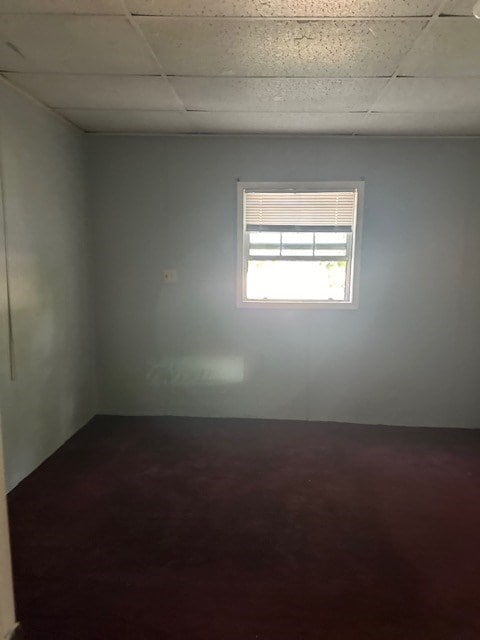 empty room with a drop ceiling