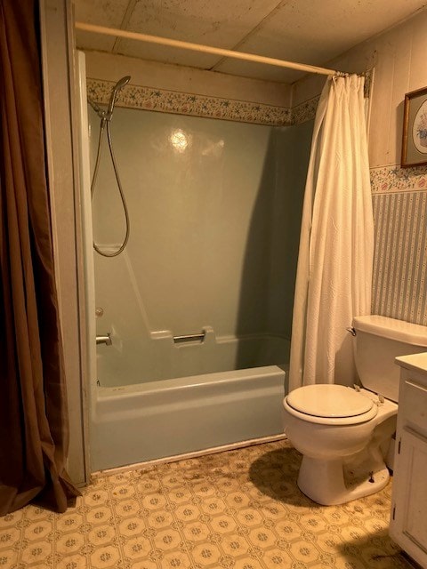 bathroom featuring shower / bath combo, vanity, and toilet