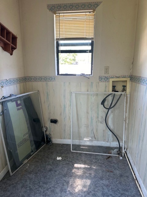 bathroom featuring a wainscoted wall