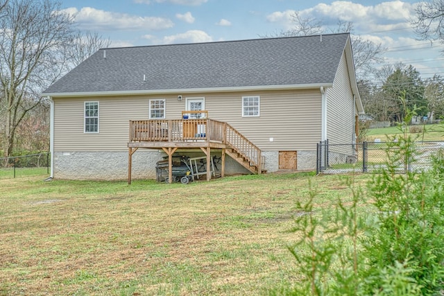 back of house with a lawn, stairway, a gate, fence, and a wooden deck