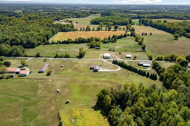 birds eye view of property featuring a rural view