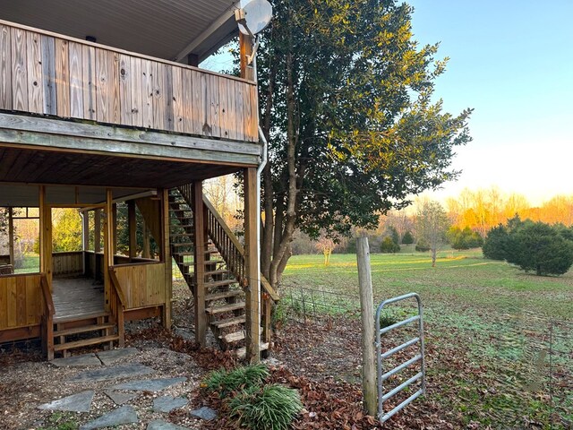 view of yard featuring stairway