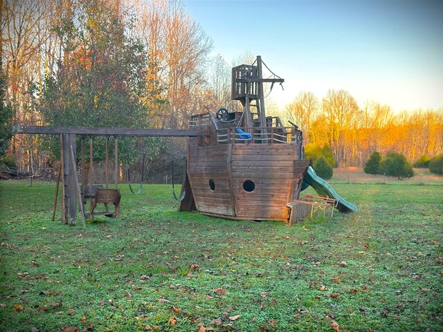 playground at dusk with a lawn and a playground