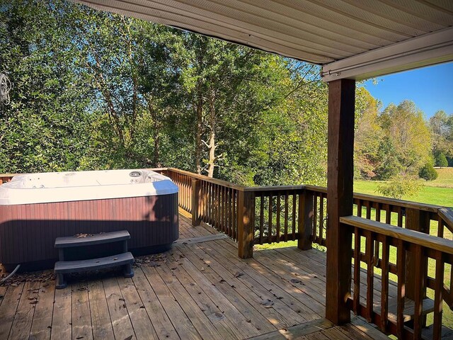 deck with a hot tub