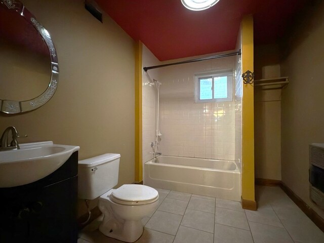 full bathroom featuring baseboards, toilet, shower / tub combination, tile patterned floors, and vanity