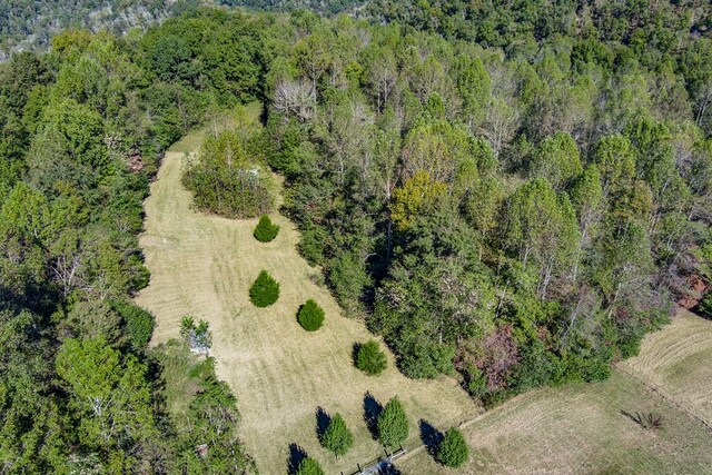 aerial view featuring a view of trees