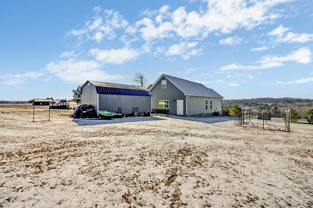 exterior space with an outbuilding and an outdoor structure