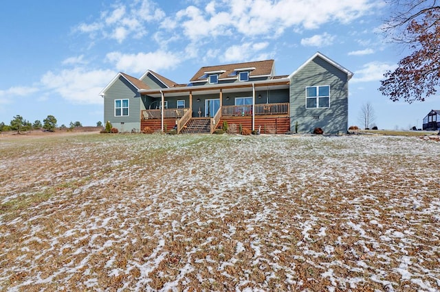 view of front of house with covered porch and crawl space