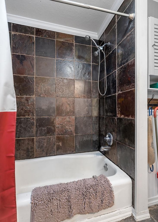 bathroom featuring shower / tub combo, crown molding, and a textured ceiling