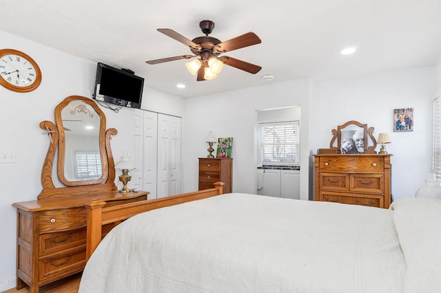 bedroom featuring a ceiling fan, recessed lighting, and a closet