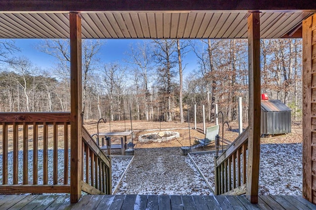 deck with an outdoor fire pit