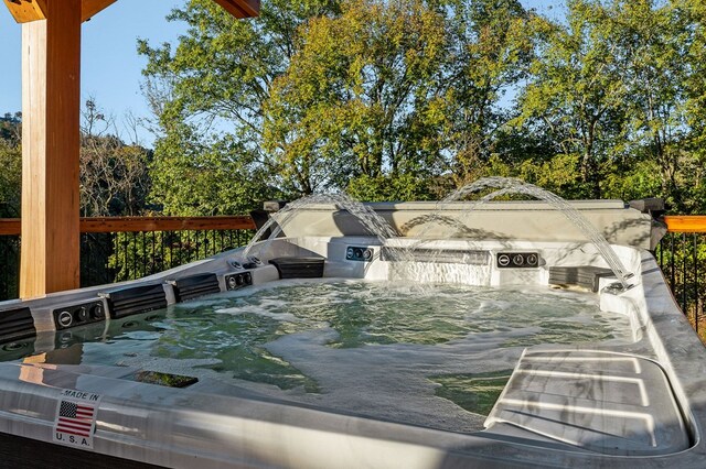 exterior space featuring a hot tub