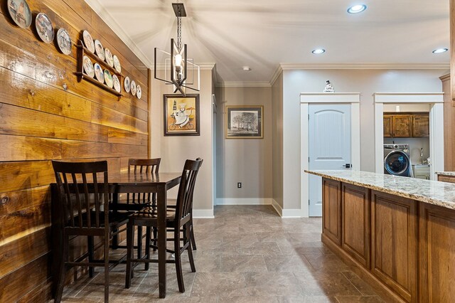 dining area featuring baseboards, washer / clothes dryer, recessed lighting, and crown molding