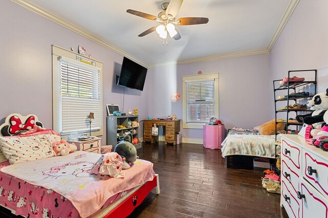 bedroom featuring ornamental molding, dark wood-type flooring, a ceiling fan, and baseboards