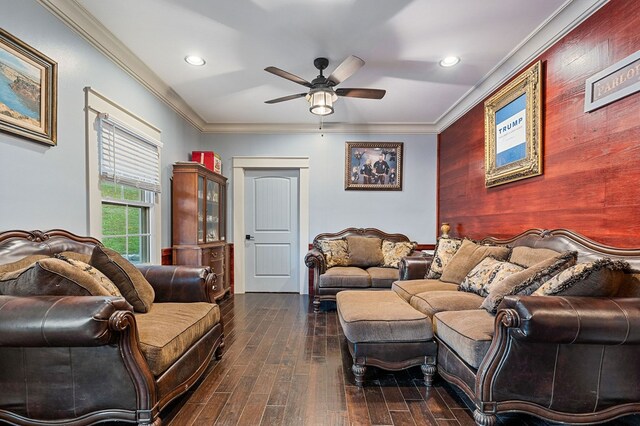 living area featuring ceiling fan, ornamental molding, dark wood finished floors, and recessed lighting