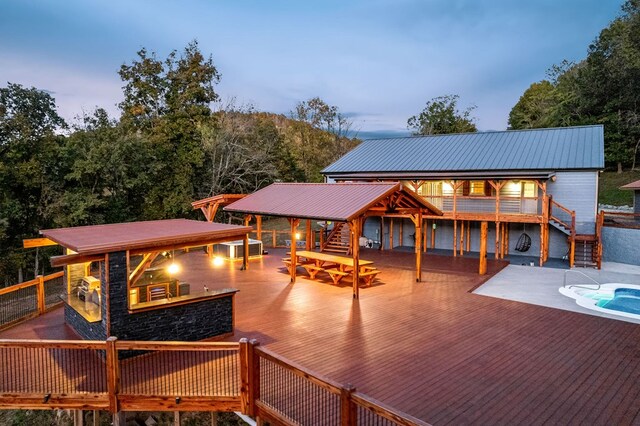 exterior space with stairs and an outdoor pool