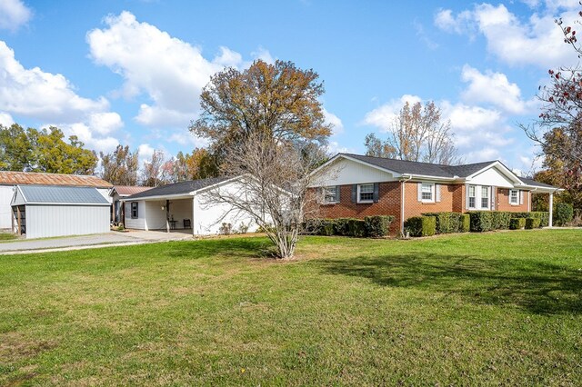 ranch-style home with brick siding and a front yard