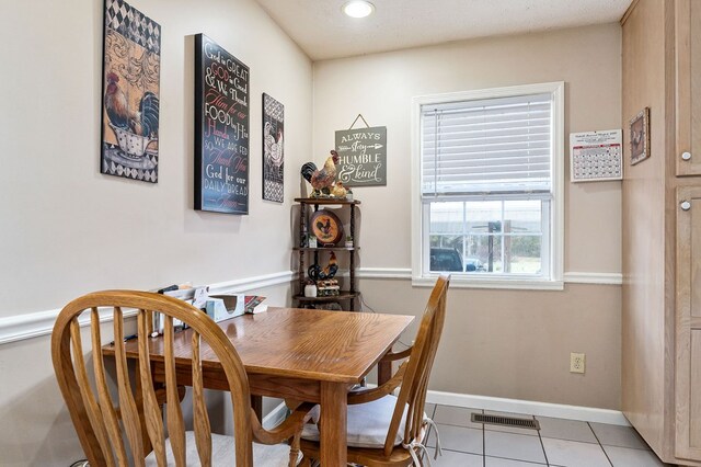 dining space featuring recessed lighting, visible vents, baseboards, and light tile patterned floors