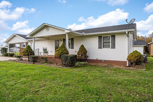 single story home with a front yard, crawl space, and central AC