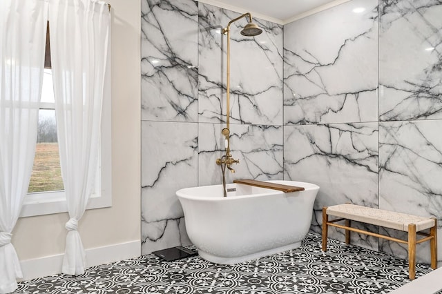 full bath featuring walk in shower, a freestanding tub, and tile patterned floors