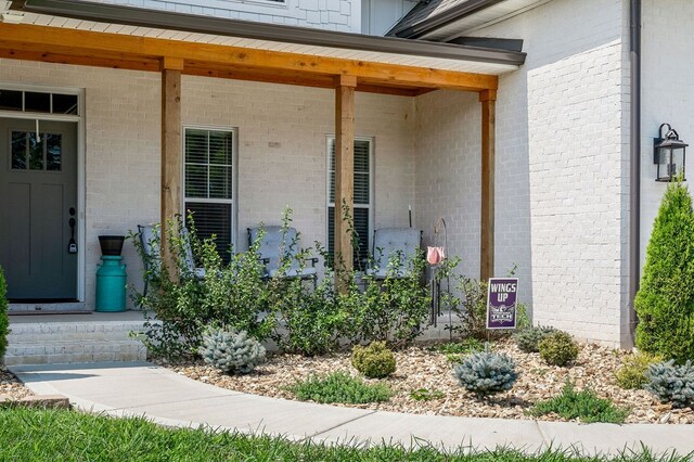 property entrance with a porch